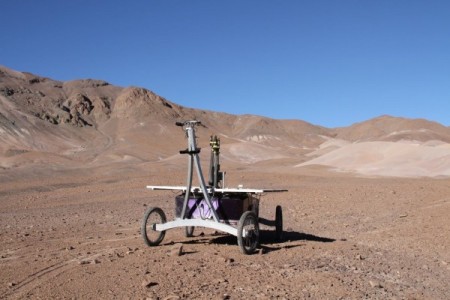 An autonomous rover designed and built by the Robotics Institute drilled into the soil of the Atacama Desert in 2013 and discovered unusual, highly specialized microbes.
