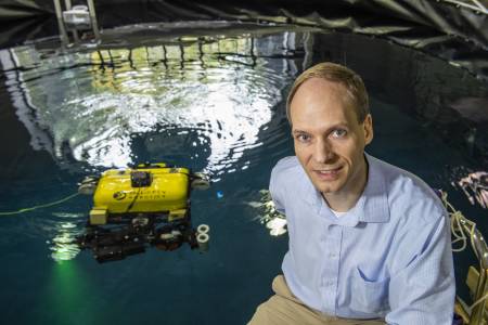 Photo of Michael Kaess with his Submersible Robot
